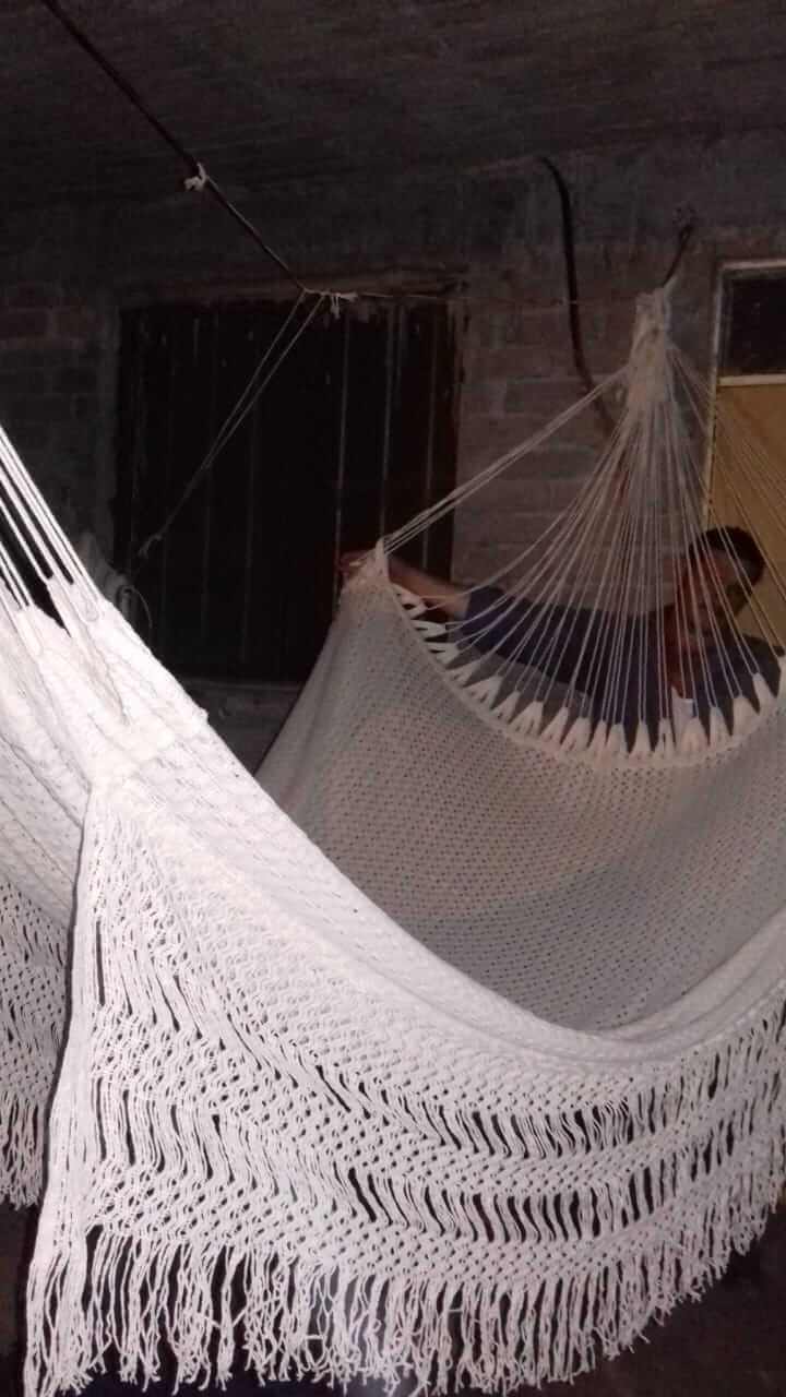 comfortable indoor outdoor hammock hanging between trees with breathable fabric and sturdy support ropes