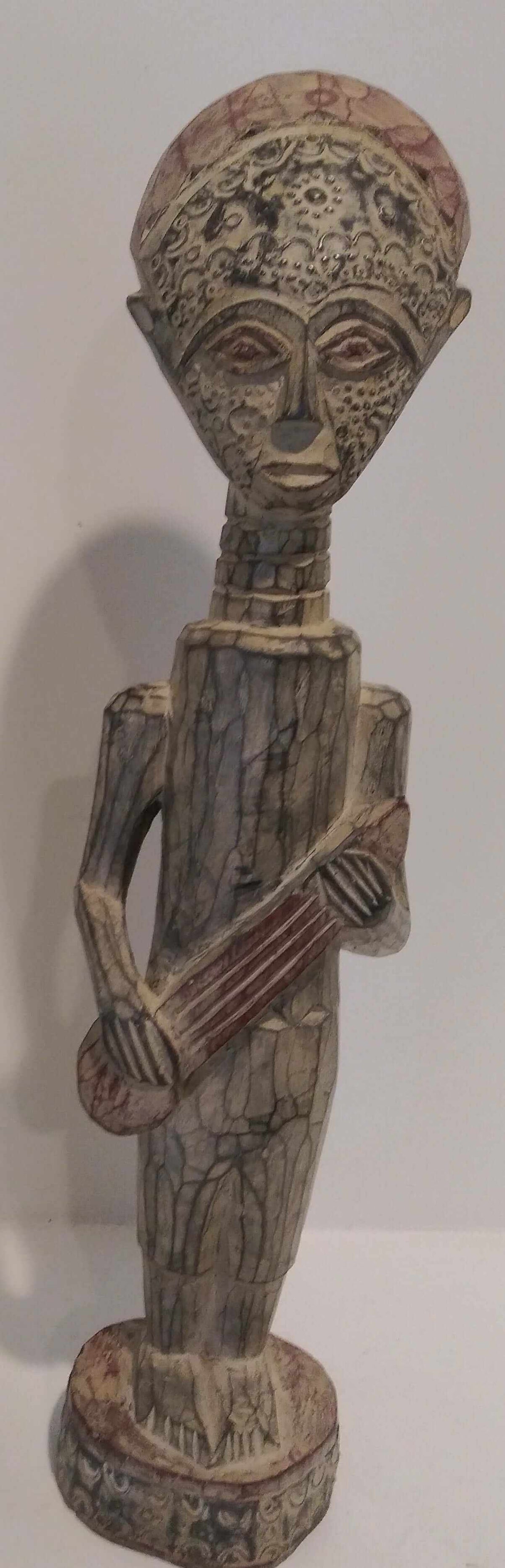 Handcrafted African tribal statue symbolizing strength and cultural heritage