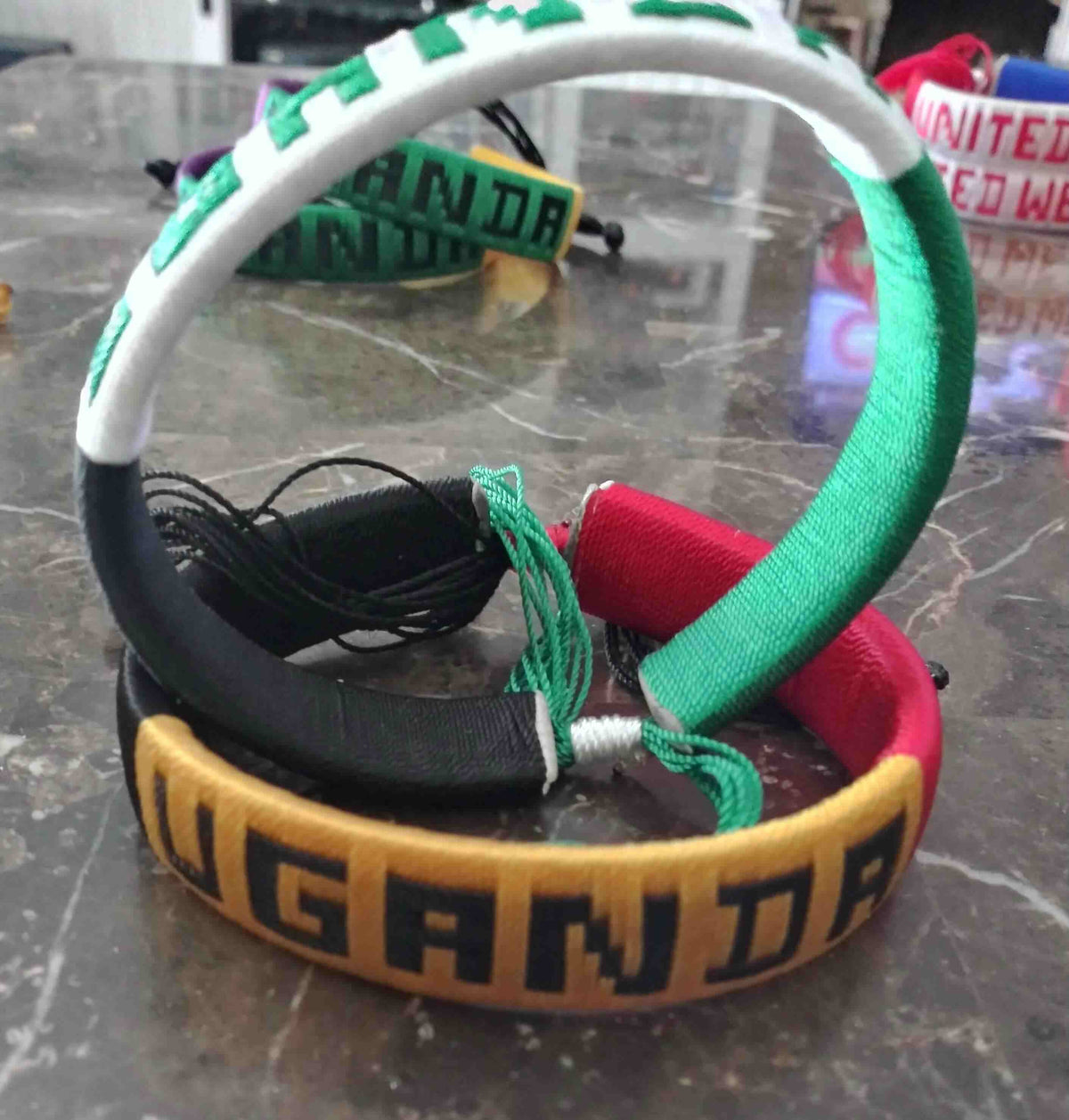 Colorful handmade elegant bracelets featuring the word &
