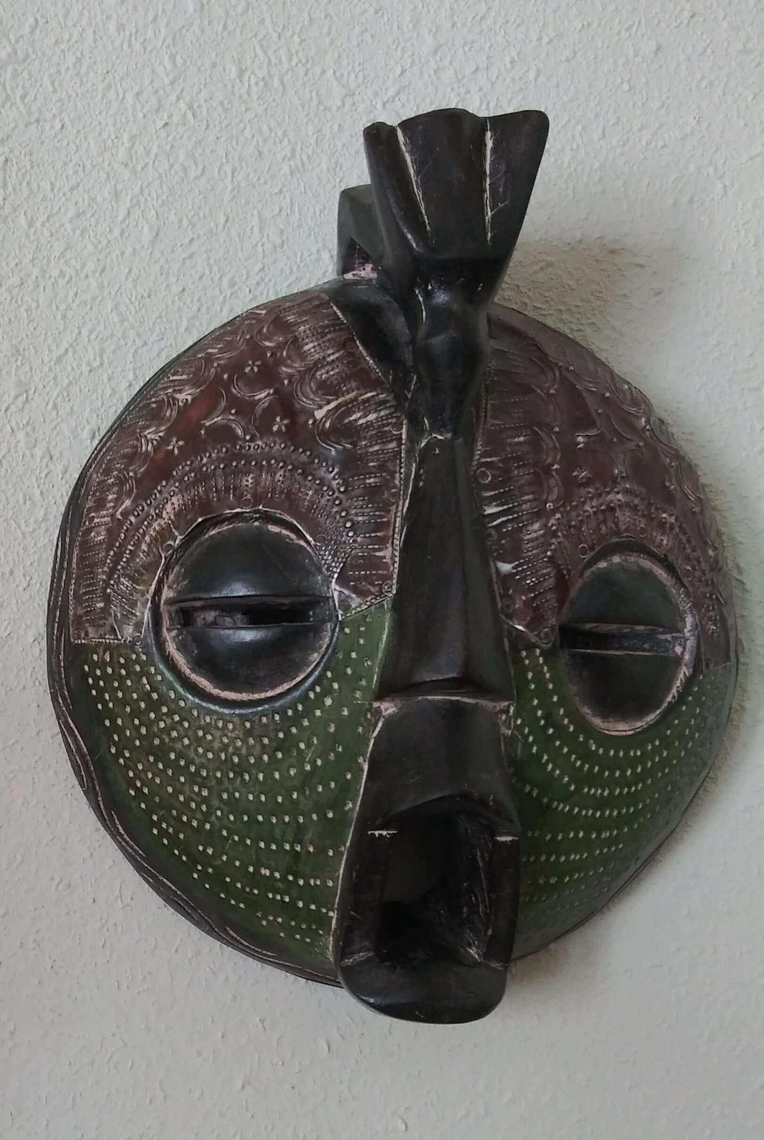 Handcrafted Round Lovers Mask with African tribal patterns symbolizing love and unity