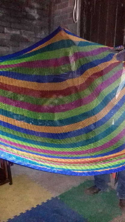 Colorful hammock showcasing comfortable indoor outdoor hammock design for relaxation.