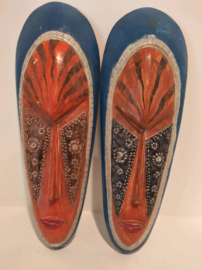 Authentic African tribal mask showcasing detailed craftsmanship and vibrant colors, representing cultural heritage.