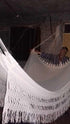 comfortable indoor outdoor hammock hanging between trees with breathable fabric and sturdy support ropes