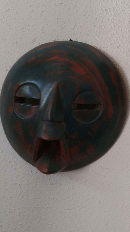 Handcrafted Round Lovers Mask with tribal patterns, symbolizing unity and love.