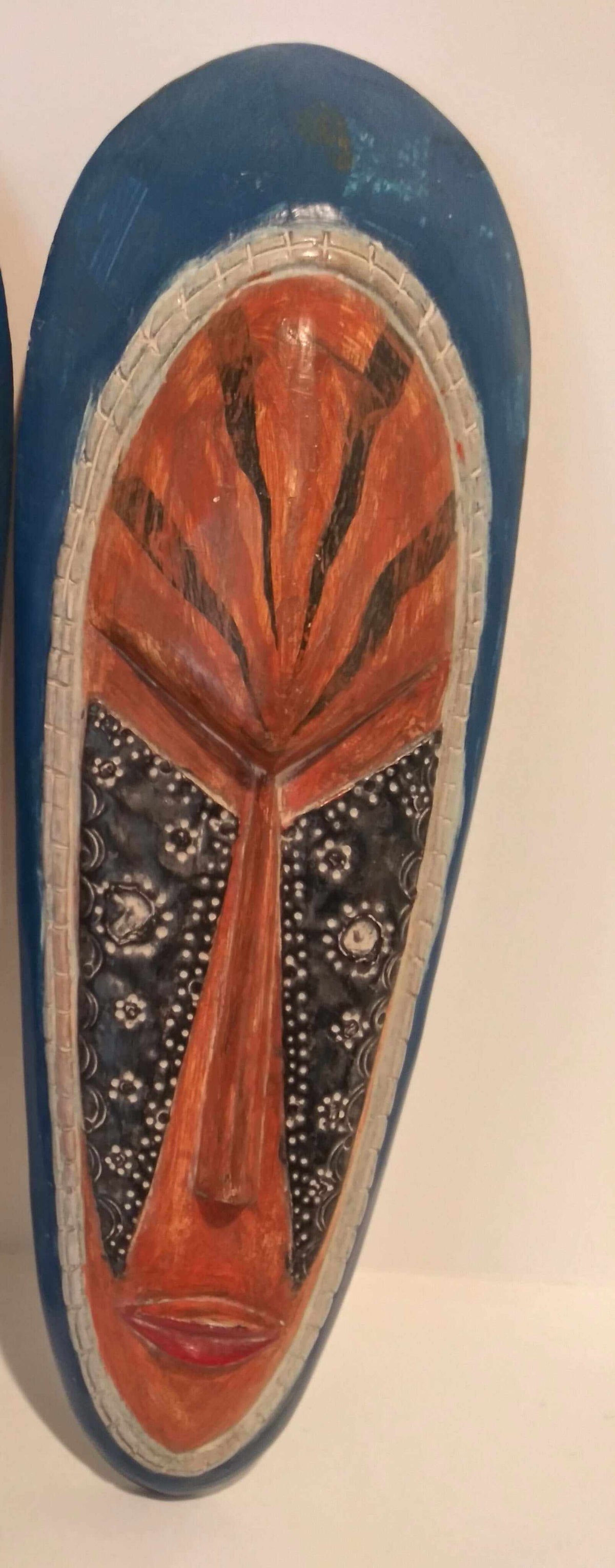 Authentic African tribal mask with intricate carvings and cultural symbolism