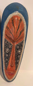 Authentic African tribal mask with intricate carvings and cultural symbolism