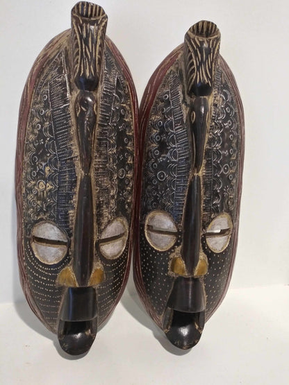 Handcrafted long wall masks with African tribal design in high-quality wood and unique patterns.